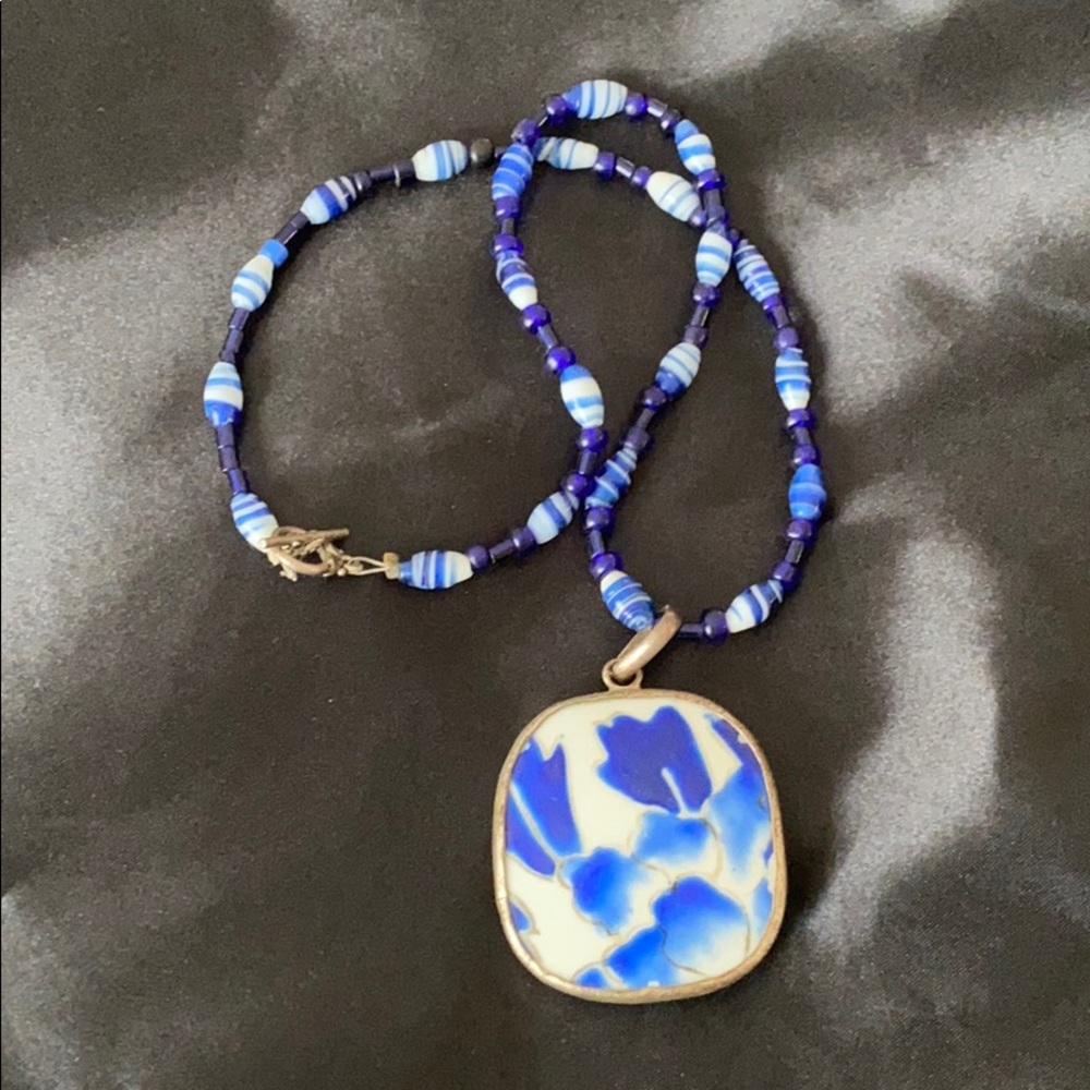 Handmade ceramic necklace by local artisan